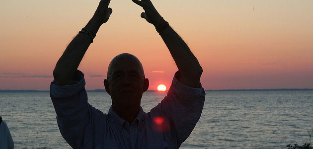Man Doing Yoga at Sunset
